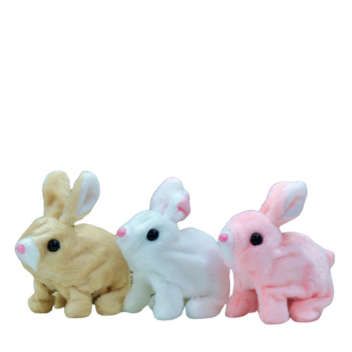 Three small rabbit figurines in beige, white, and pink on a white background