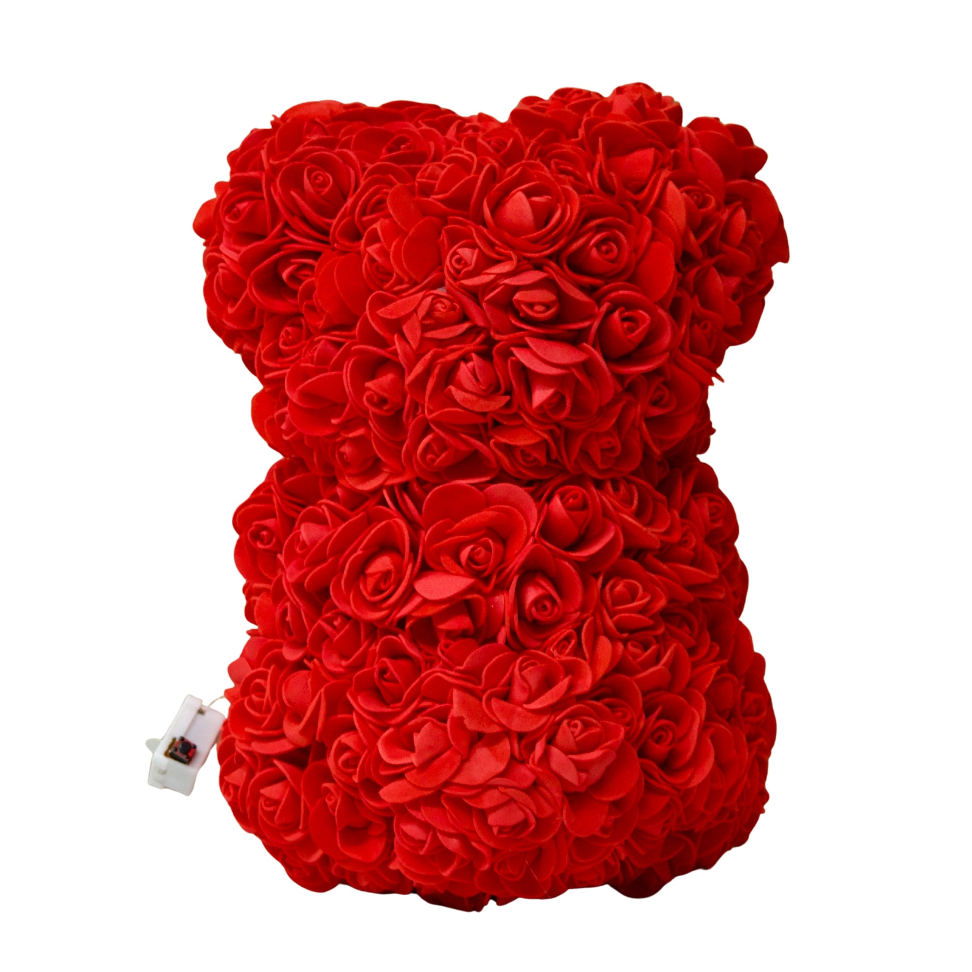 Red rose teddy bear on a white background