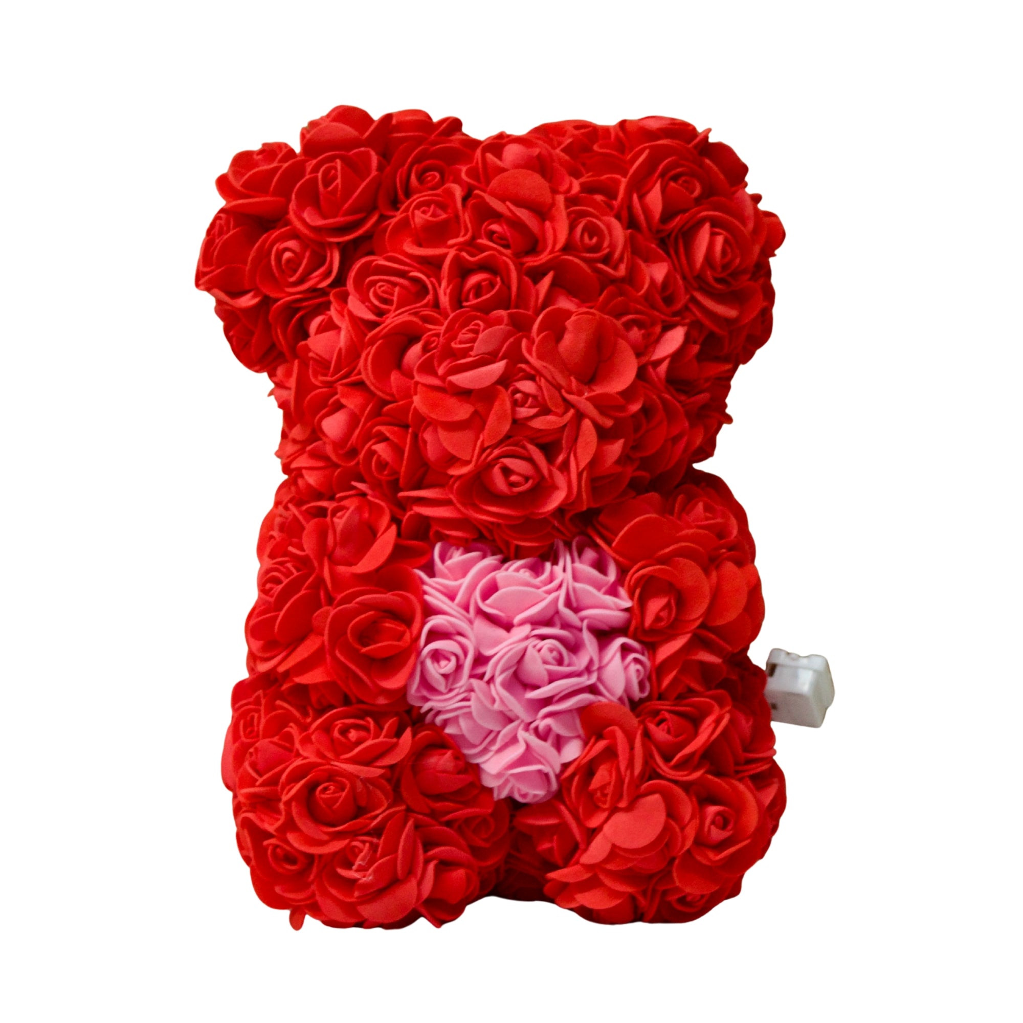 Red rose teddy bear with a pink heart on a white background