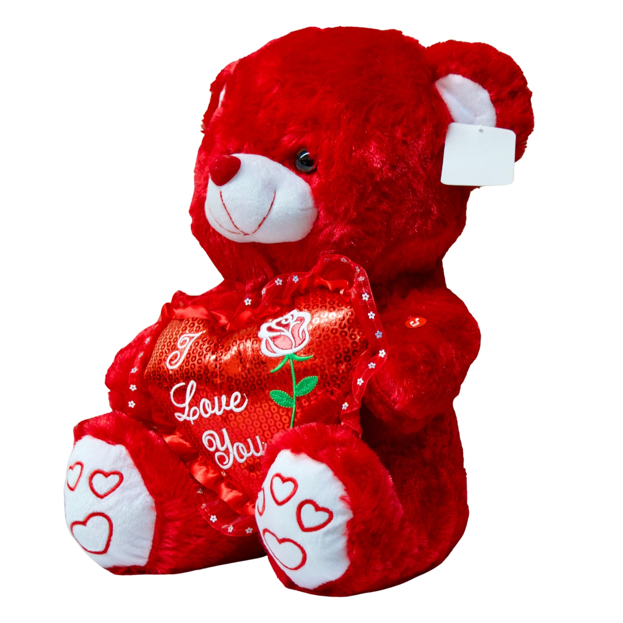 Red teddy bear holding a heart-shaped pillow with 'I Love You' text on a white background