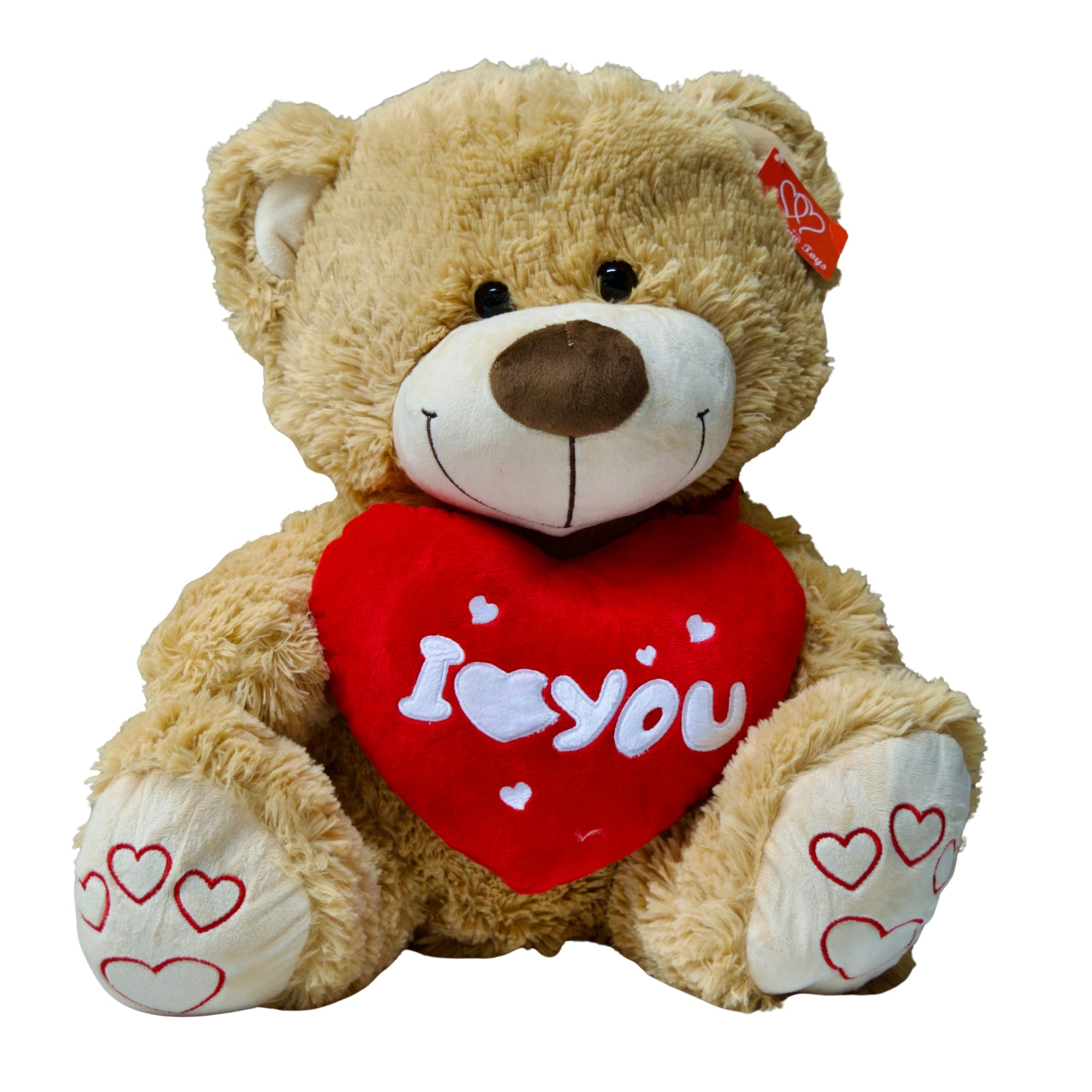Teddy bear with a red heart that says 'I love you' on a white background